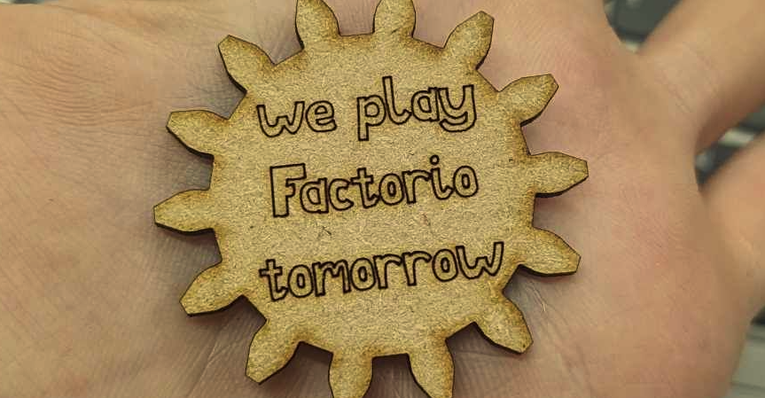 Picture of laser-cut wood, with bogface font